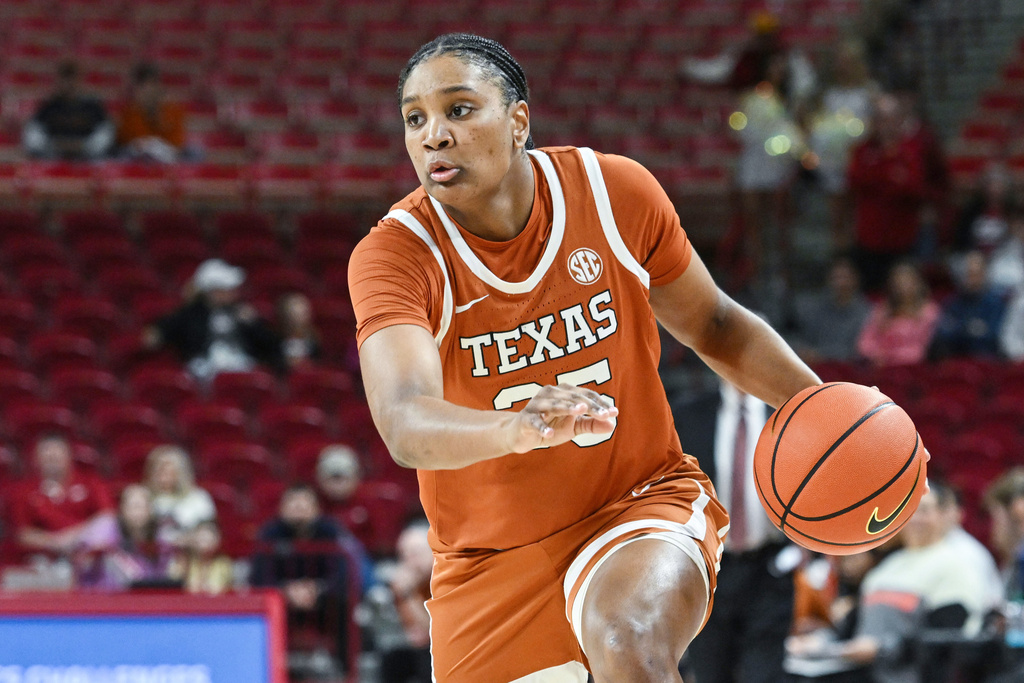 FILE - Texas forward Madison Booker (35) runs a play against Arkansas during an NCAA college basketball game Thursday, Feb. 19, 2026, in Fayetteville, Ark. (AP Photo/Michael Woods, File)