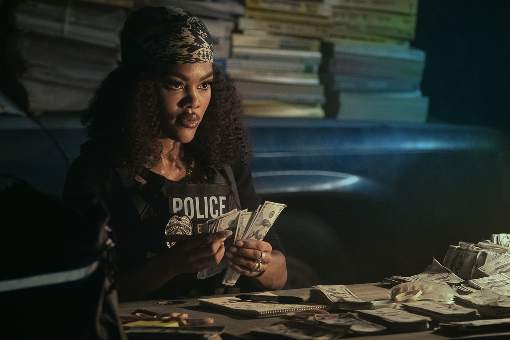 This image released by Netflix shows Teyana Taylor in a scene from "The Rip." (Claire Folger/Netflix via AP)