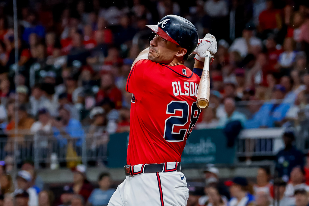 Atlanta Braves' Matt Olson follows through on a solo home run against the Philadelphia Phillies during the first inning of a baseball game, Friday, Sept. 11, 2026, in Atlanta. (AP Photo/Erik S. Lesser)