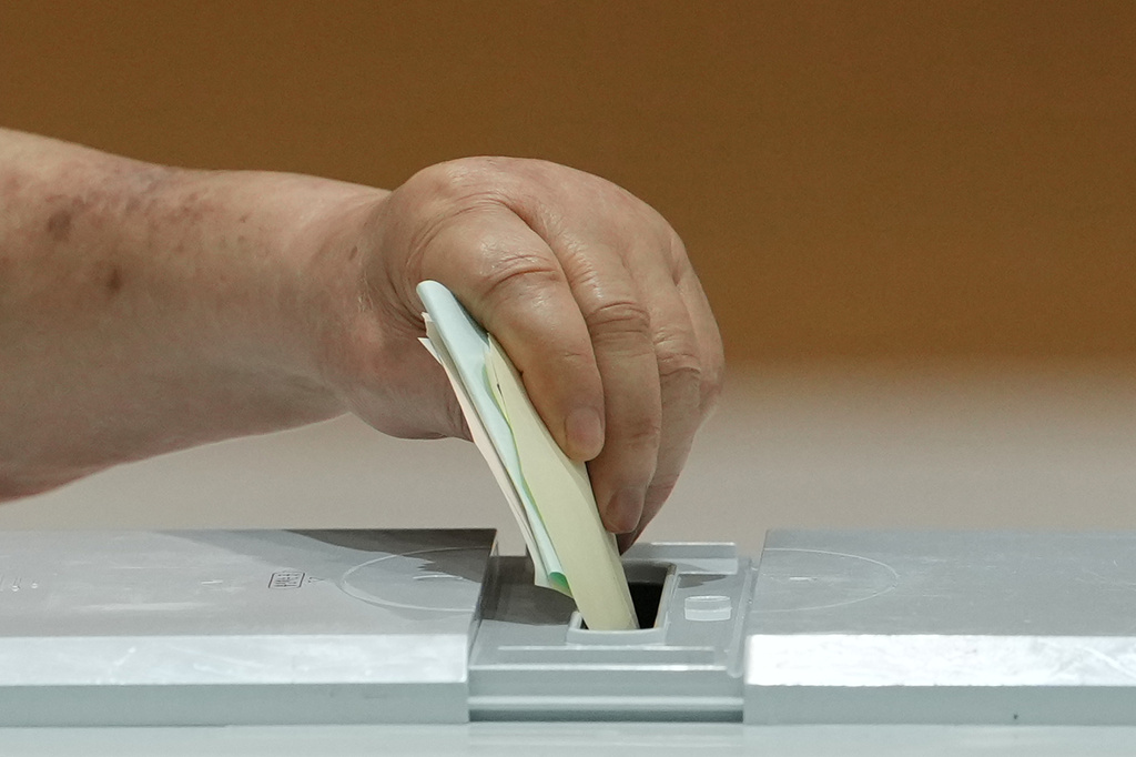 A voter casts his votes for the nationwide simultaneous local elections at a polling station in Seoul, South Korea, Wednesday, June 3, 2026. (AP Photo/Lee Jin-man)