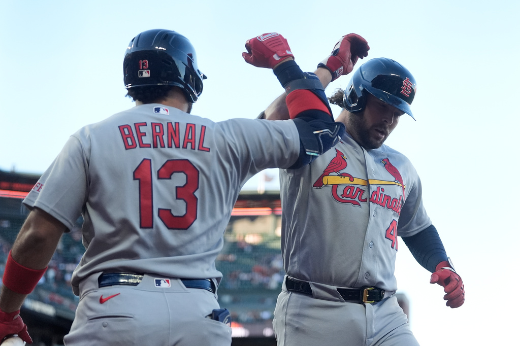 St. Louis Cardinals' Alec Burleson, right, is congratulated by Leo Bernal (13) after hitting a home run against the San Francisco Giants during the sixth inning of a baseball game, Monday, Sept. 7, 2026, in San Francisco. (AP Photo/Jeff Chiu)