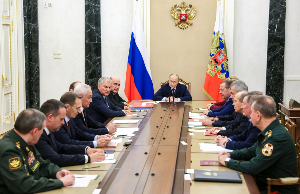 Russian President Vladimir Putin chairs a meeting with members of the Security Council in Moscow, Russia, Wednesday, Nov. 5, 2025. (Gavriil Grigorov, Sputnik, Kremlin Pool Photo via AP)