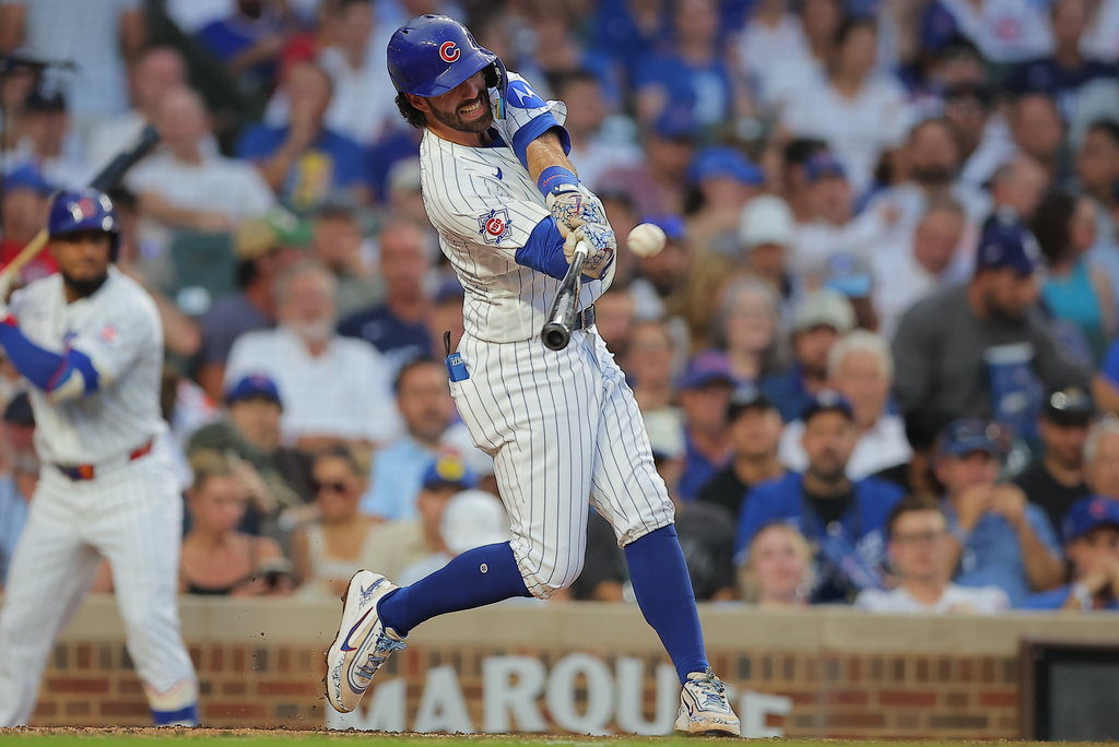 Chicago Cubs' Dansby Swanson hits a home run during the third inning of a baseball game against the Los Angeles Dodgers, Tuesday, Aug. 4, 2026, in Chicago. (AP Photo/Melissa Tamez)