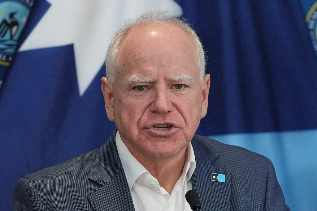 Minnesota Gov. Tim Walz speaks during a news conference in Blaine, Minn., Sunday, Jan. 25, 2026. (AP Photo/Abbie Parr)