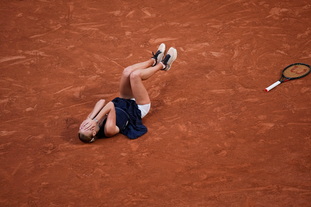 Anastasia Potapova of Austria reacts after winning the third round women's singles tennis match against Coco Gauff of the U.S. at the French Open tennis tournament in Paris, Saturday, May 30, 2026. (AP Photo/Christophe Ena)