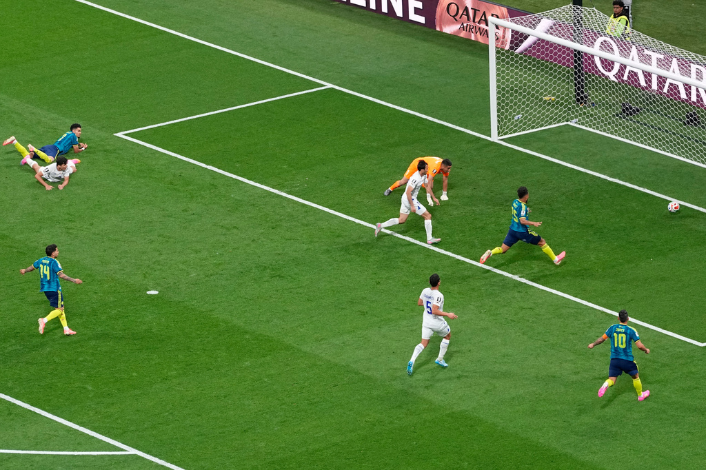 Colombia's Luis Diaz (7), left, scores his side's second goal during the World Cup Group K soccer match between Uzbekistan and Colombia in Mexico City, Wednesday, June 17, 2026. (AP Photo/Silvia Izquierdo)
