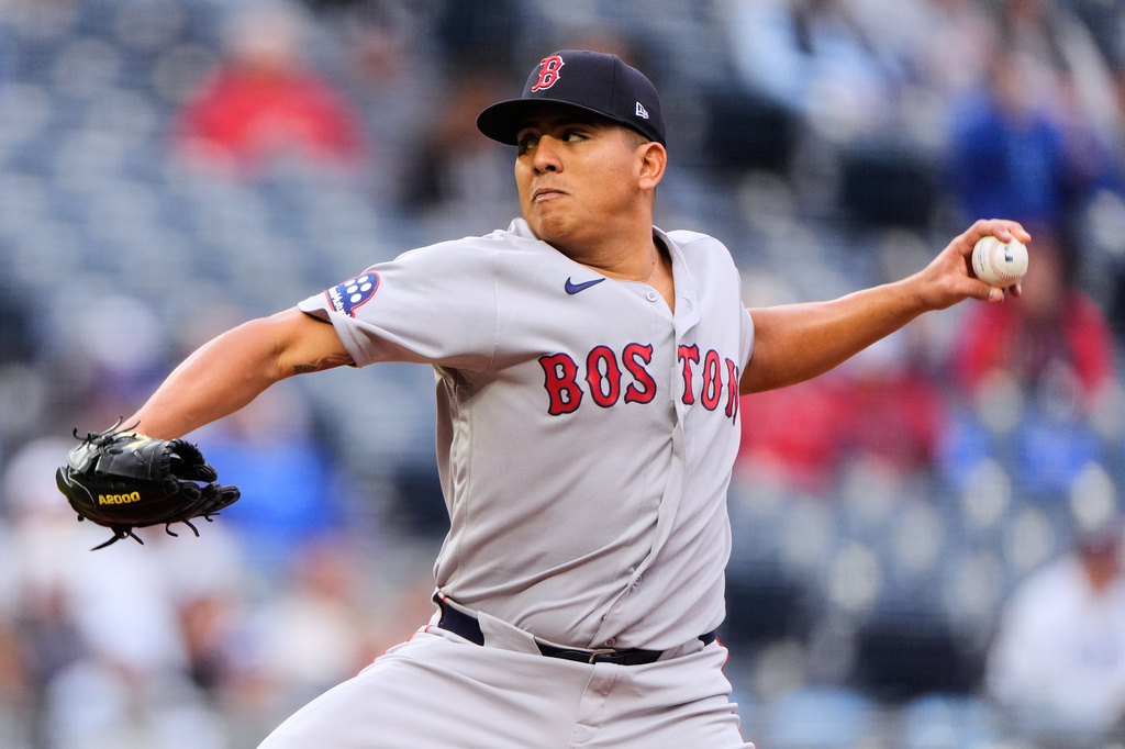 Boston Red Sox starting pitcher Ranger Suarez throws during the first inning of a baseball game against the Kansas City Royals, Tuesday, May 19, 2026, in Kansas City, Mo. (AP Photo/Charlie Riedel)