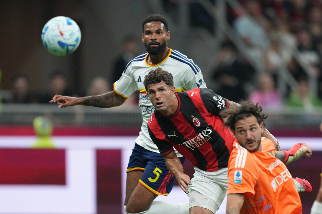 AC Milan's Christian Pulisic scores their opening goal during the Serie A soccer match between AC Milan and Lecce, in Milan, Italy, Sunday, Sept. 20, 2026. (AP Photo/Antonio Calanni)