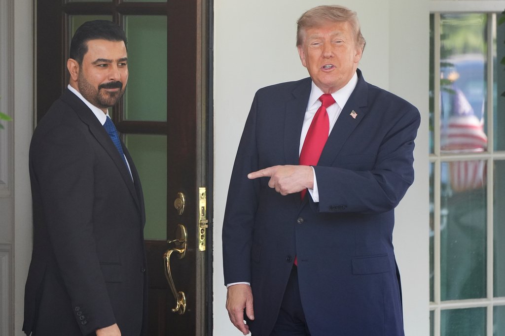 President Donald Trump, gestures as he greets Iraq's Prime Minister Ali al-Zaidi at the White House, Tuesday, July 14, 2026, in Washington.(AP Photo/Alex Brandon)