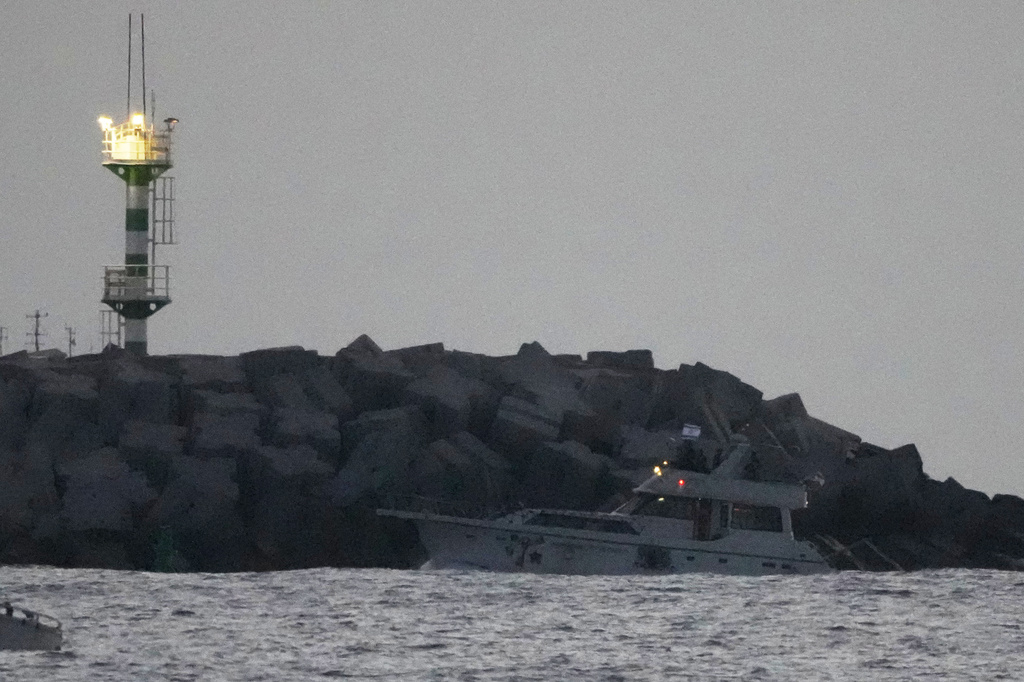 Israeli naval forces sail a confiscated Gaza-bound flotilla boat into Israel's Ashdod port after intercepting the vessel on the Mediterranean Sea, Tuesday, May 19, 2026. (AP Photo/Ariel Schalit)
