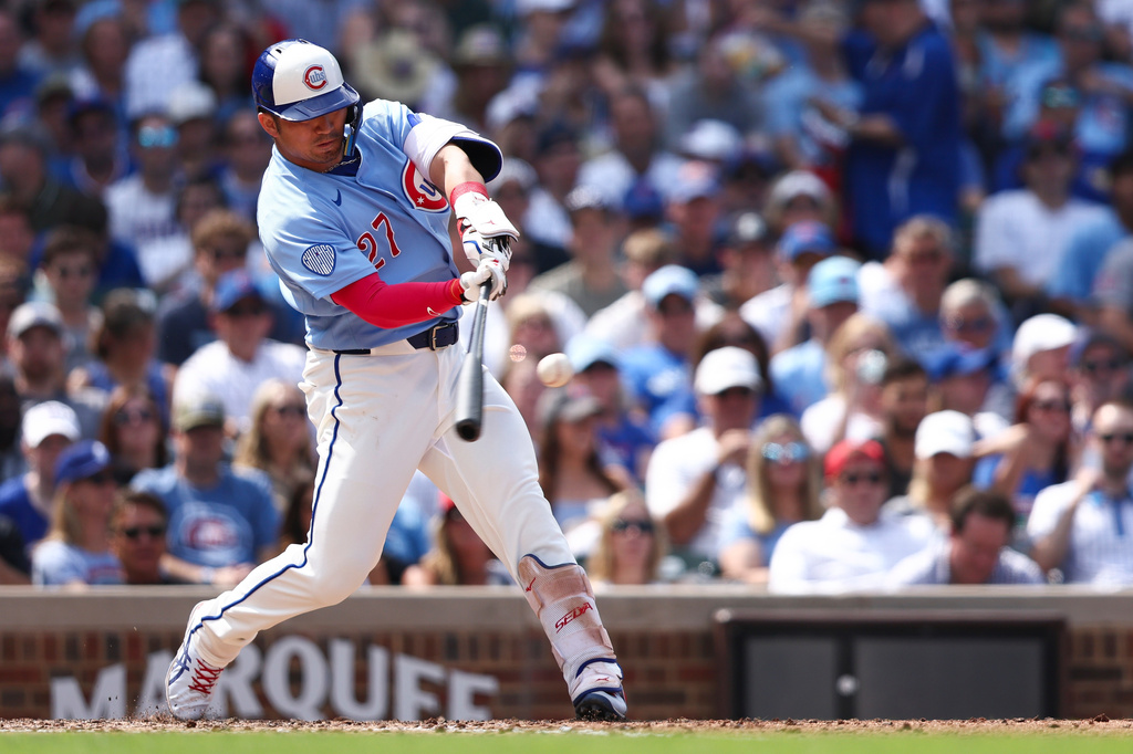 Chicago Cubs designated hitter Seiya Suzuki hits a home run during the sixth inning of a baseball game against the St. Louis Cardinals in Chicago, Friday, Aug. 14, 2026. (AP Photo/Jessie Alcheh)