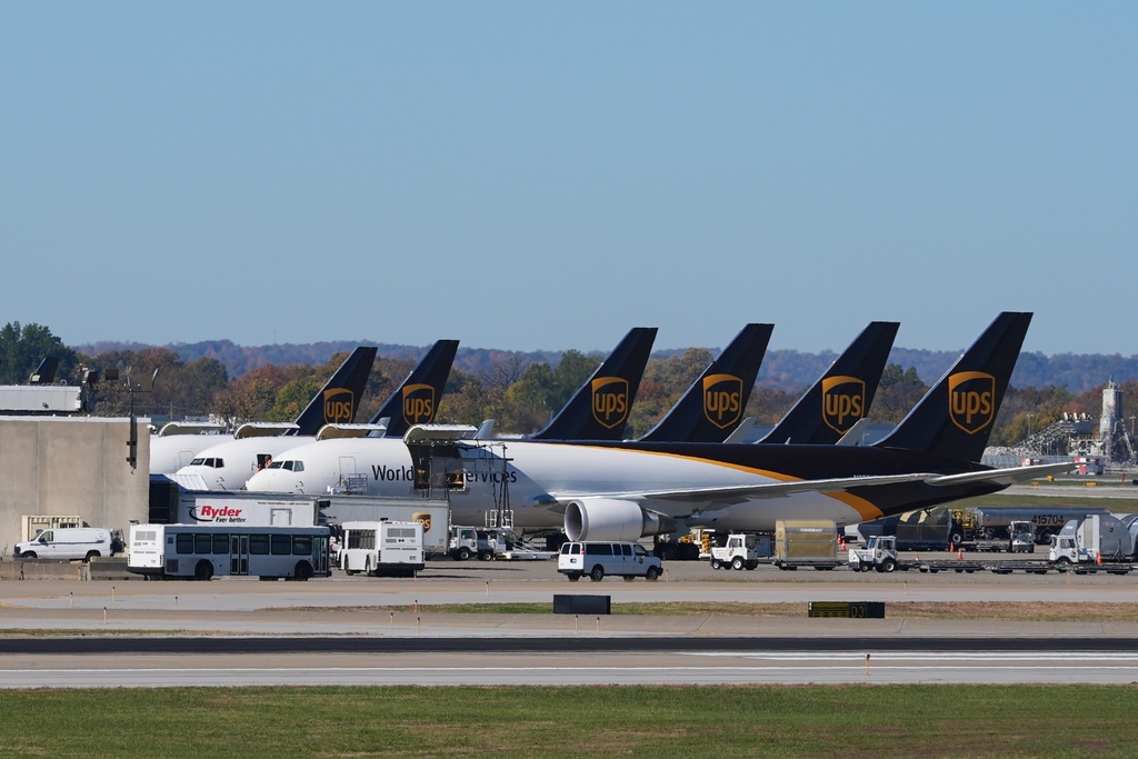 UPS jets are parked at the Worldport package sorting complex at Louisville Muhammad Ali International Airport, Thursday, Nov. 6, 2025, in Louisville, Ky. (AP Photo/Darron Cummings)