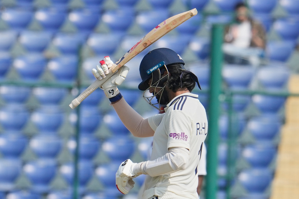 India's KL Rahul celebrates after scoring fifty runs on the fifth day of the second cricket test match between India and West Indies at the Arun Jaitley Stadium in New Delhi, India, Tuesday, Oct.14, 2025. (AP Photo/Manish Swarup)