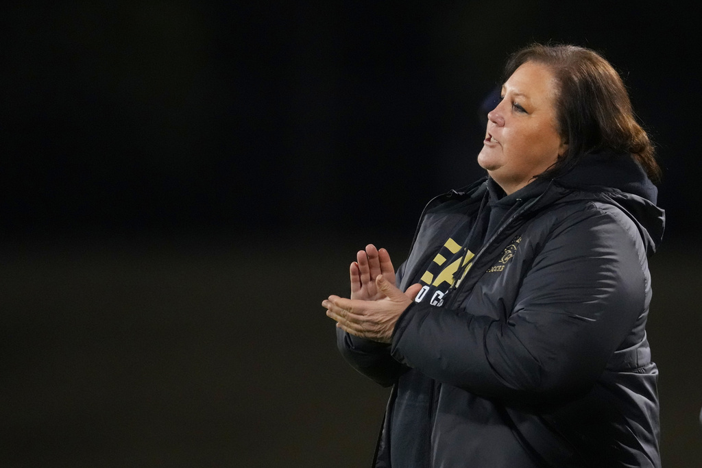 Plano East varsity soccer head coach Cristy Cooley reacts during a soccer game against Rock Hill, Jan. 30, 2026, in Murphy, Texas. (AP Photo/Julio Cortez)