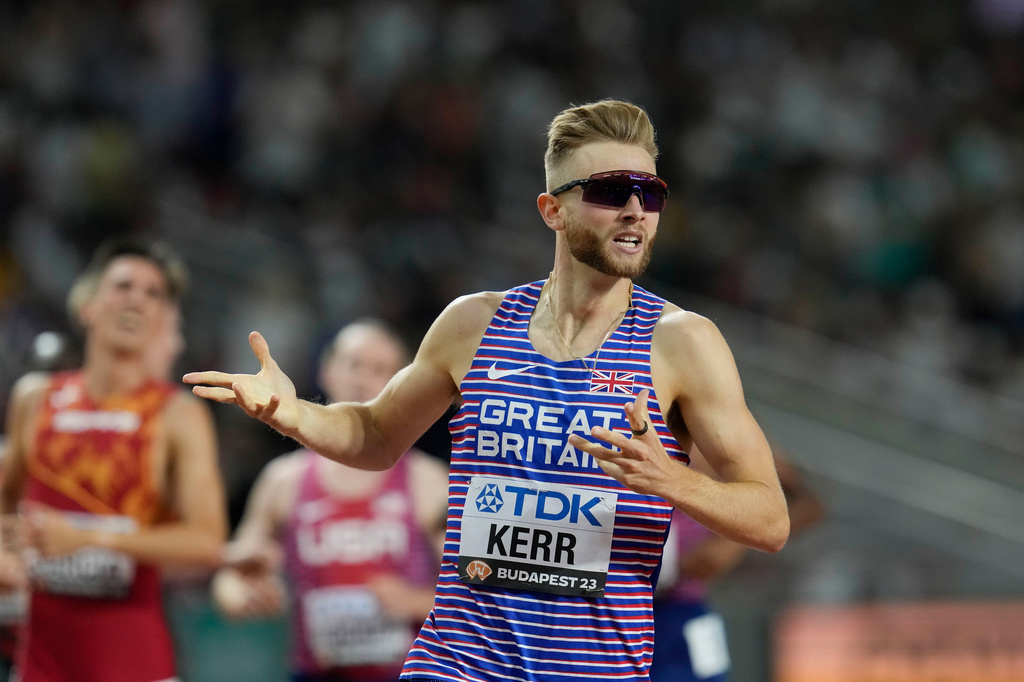 FILE - Josh Kerr, of Great Britain, reacts after winning the men's 1500-meters final during the World Athletics Championships in Budapest, Hungary, Wednesday, Aug. 23, 2023. (AP Photo/Ashley Landis, file)