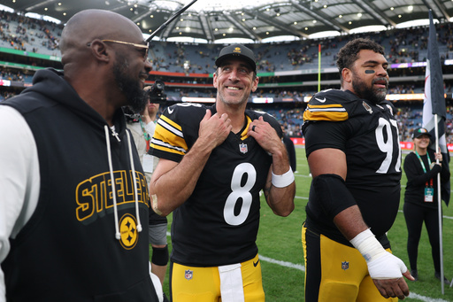 Pittsburgh Steelers head coach Mike Tomlin from left, Pittsburgh Steelers quarterback Aaron Rodgers (8) and Pittsburgh Steelers defensive tackle Cameron Heyward (97) celebrate after winning the NFL football game between Minnesota Vikings and Pittsburgh Steelers at Croke Park stadium in Dublin, Sunday, Sept. 28, 2025.(AP Photo/Ian Walton) Pittsburgh Steelers head coach Mike Tomlin from left, Pittsburgh Steelers quarterback Aaron Rodgers (8) and Pittsburgh Steelers defensive tackle Cameron Heyward (97) celebrate after winning the NFL football game between Minnesota Vikings and Pittsburgh Steelers at Croke Park stadium in Dublin, Sunday, Sept. 28, 2025.(AP Photo/Ian Walton)
