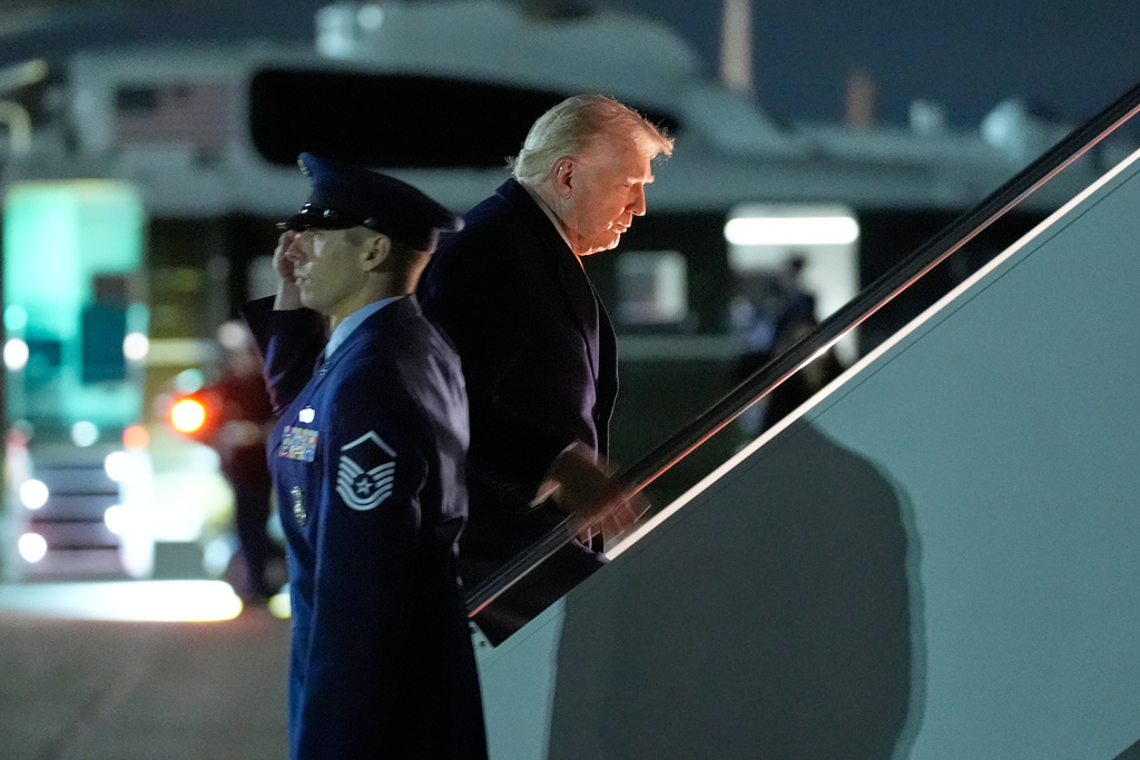 President Donald Trump boards Air Force One at Joint Base Andrews, Md., on his way to his Mar-a-Lago estate in Palm Beach, Fla., Friday, Nov. 14, 2025. (AP Photo/Manuel Balce Ceneta)