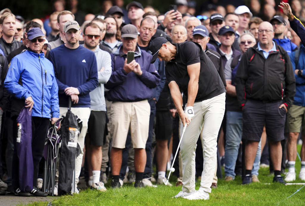 Ludvig Aberg competes during day one of the 2025 BMW PGA Championship at Wentworth Golf Club in Virginia Water, Surrey, England, Thursday Sept. 11, 2025. (Adam Davy/PA via AP)