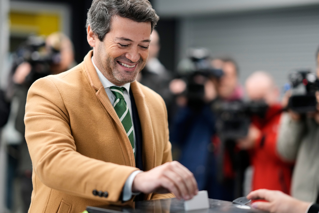 Presidential candidate Andre Ventura, of the populist Chega party, casts his ballot in Portugal's presidential election at a polling station in Lisbon, Sunday, Jan. 18, 2026. (AP Photo/Armando Franca)