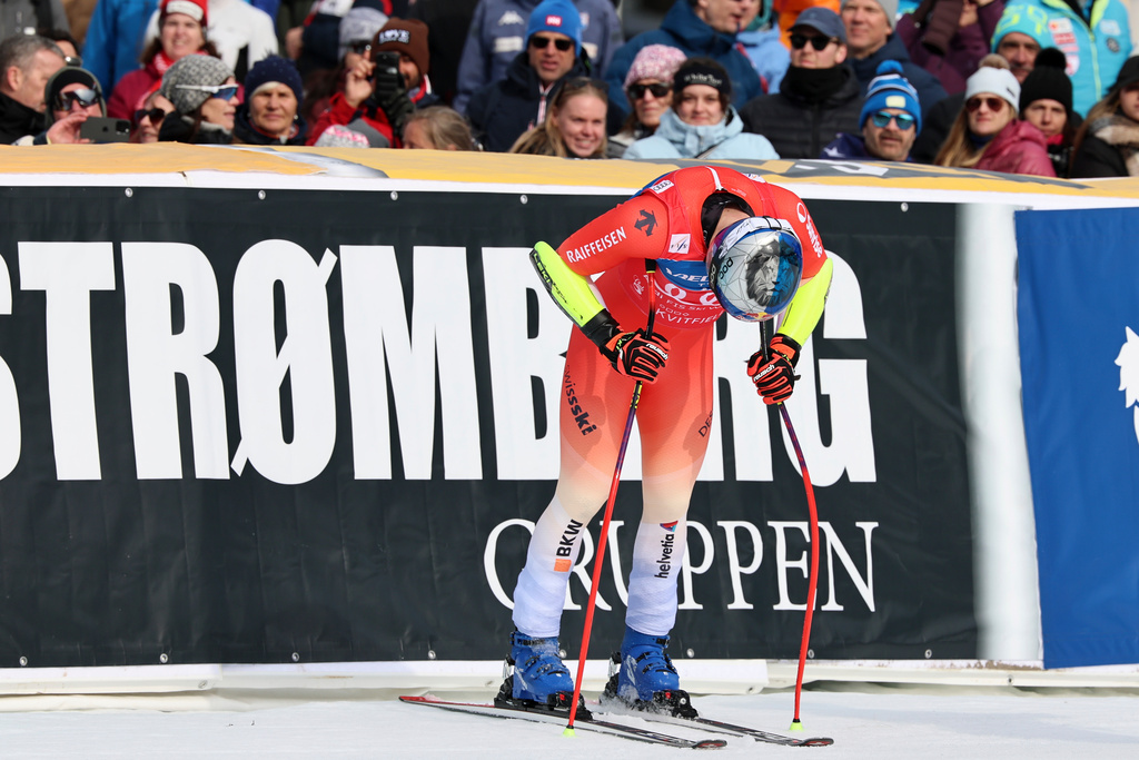 Switzerland's Marco Odermatt at the finish area of an alpine ski, men's super-G race, at the Lillehammer World Cup Finals, in Kvitfjell, Norway, Sunday, March 22, 2026. (AP Photo/Marco Trovati)