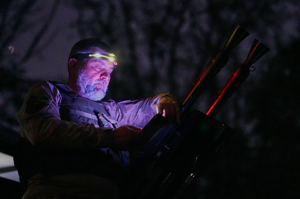 A Ukrainian air defense soldier gets ready to repel Russia's drone attack in Kyiv, Ukraine, late Saturday, Sept. 19, 2026. (AP Photo/Efrem Lukatsky)