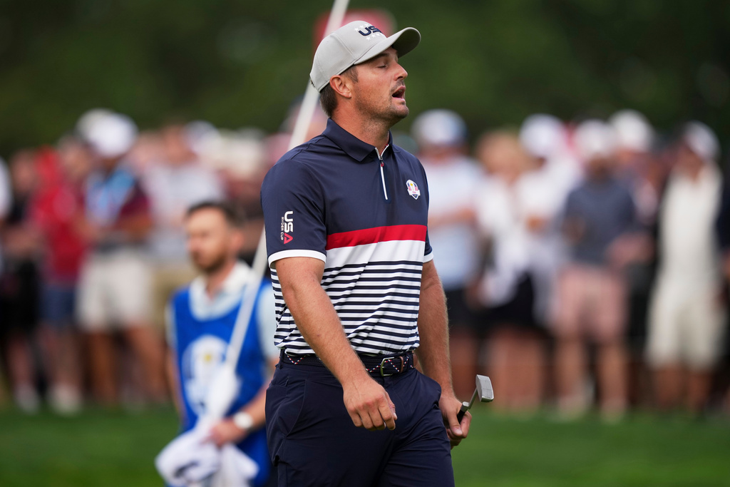 United States' Bryson DeChambeau reacts after missing a putt on the fifth hole at Bethpage Black golf course during the Ryder Cup golf tournament, Friday, Sept. 26, 2025, in Farmingdale, N.Y. (AP Photo/Matt Slocum)