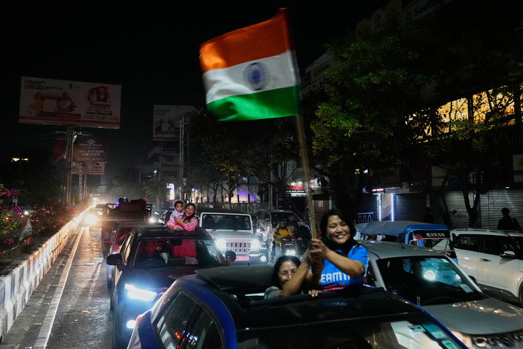 Cricket fans celebrate India's win in the T20 World Cup cricket final match against New Zealand, in Guwahati, India, Sunday, March 8, 2026. (AP Photo/Anupam Nath)
