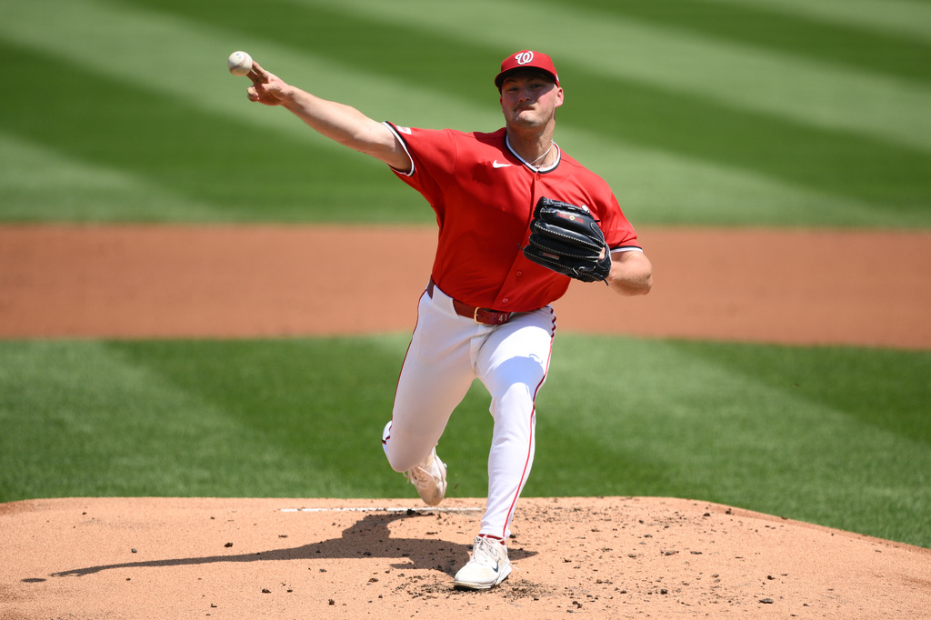 Washington Nationals pitcher Brad Lord throws during the second inning of a baseball game against the Cincinnati Reds, Sunday, Aug. 9, 2026, in Washington. (AP Photo/Nick Wass)