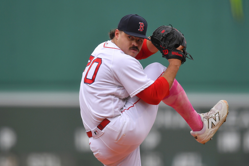 Boston Red Sox's Payton Tolle winds up to pitch to a Tampa Bay Rays batter in the first inning of a baseball game, Sunday, May 10, 2026, in Boston. (AP Photo/Steven Senne)
