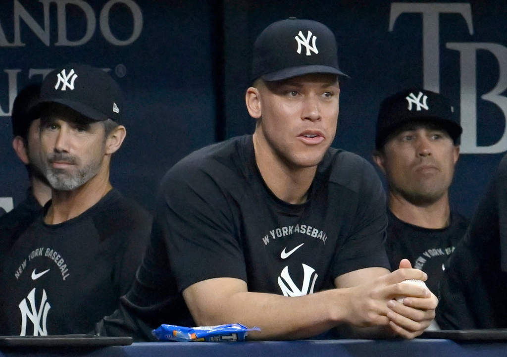 New York Yankees' Aaron Judge watches from the dugout during a baseball game against the Tampa Bay Rays Monday, July 6, 2026, in St. Petersburg, Fla. (AP Photo/Jason Behnken)