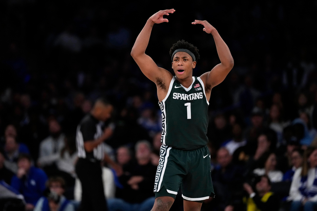 Michigan State's Jeremy Fears Jr. (1) gestures to fans during the second half of an NCAA college basketball game against Kentucky Tuesday, Nov. 18, 2025, in New York. (AP Photo/Frank Franklin II)