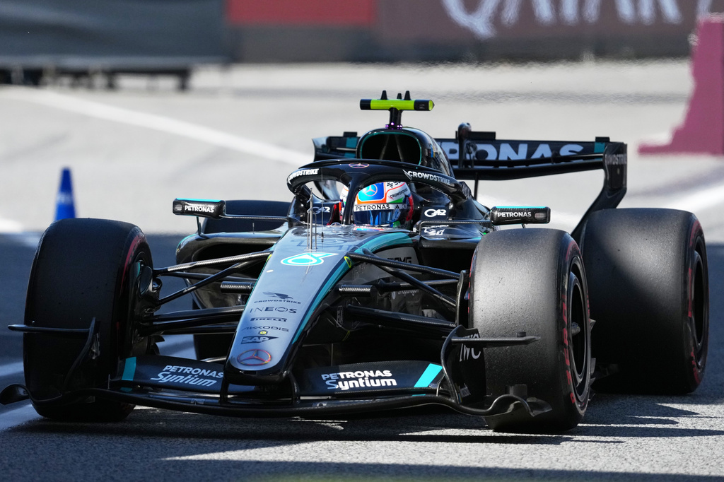 Mercedes driver George Russell of Britain returns to the pits after session for the Spain F1 Grand Prix at the Barcelona Catalunya racetrack in Montmelo, near Barcelona, Spain, Saturday, June 13, 2026. (Manaure Quintero/Pool Photo via AP)