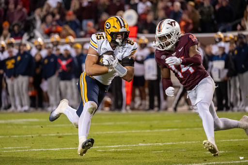 California tight end Mason Mini (85) catches the ball for a touchdown in the first overtime during an NCAA college football game between California and Virginia Tech, Friday Oct. 24, 2025, in Blacksburg, Va., (AP Photo/Robert Simmons) California tight end Mason Mini (85) catches the ball for a touchdown in the first overtime during an NCAA college football game between California and Virginia Tech, Friday Oct. 24, 2025, in Blacksburg, Va., (AP Photo/Robert Simmons)