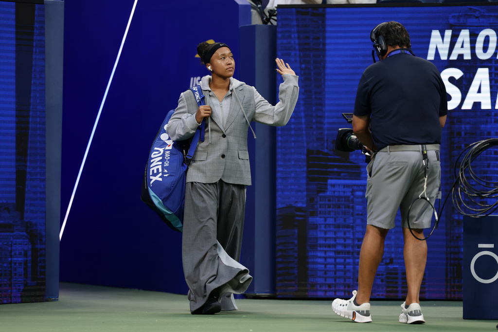 Naomi Osaka, of Japan, arrives for her match against Elise Mertens, of Belgium, in the third round of the U.S. Open tennis championships, Saturday, Sept. 5, 2026, in New York. (AP Photo/Adam Hunger)