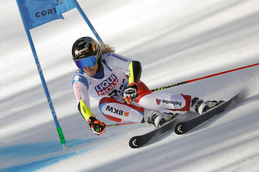 FILE - Switzerland's Lara Gut-Behrami speeds down the course on her way to win a women's giant slalom, at the alpine ski World Championships, in Cortina d'Ampezzo, Italy, Thursday, Feb. 18, 2021. (AP Photo/Gabriele Facciotti, File)