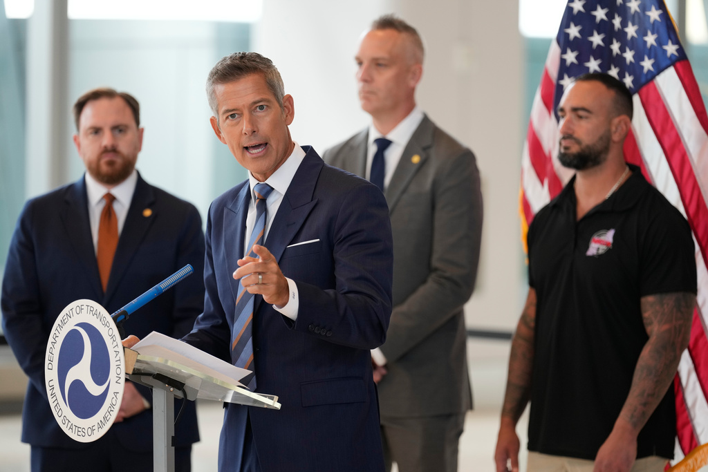 United States Secretary of Transportation Sean Duffy, second from left, speaks during a news conference at LaGuardia Airport in New York, Tuesday, Oct. 28, 2025. (AP Photo/Seth Wenig) United States Secretary of Transportation Sean Duffy, second from left, speaks during a news conference at LaGuardia Airport in New York, Tuesday, Oct. 28, 2025. (AP Photo/Seth Wenig)