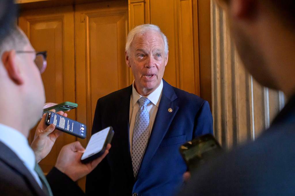 Sen. Ron Johnson, R-Wis., talks with reporters outside of the Senate chamber during a vote at the U.S. Capitol, Friday, August 7, 2026, in Washington. (AP Photo/Rod Lamkey, Jr.)