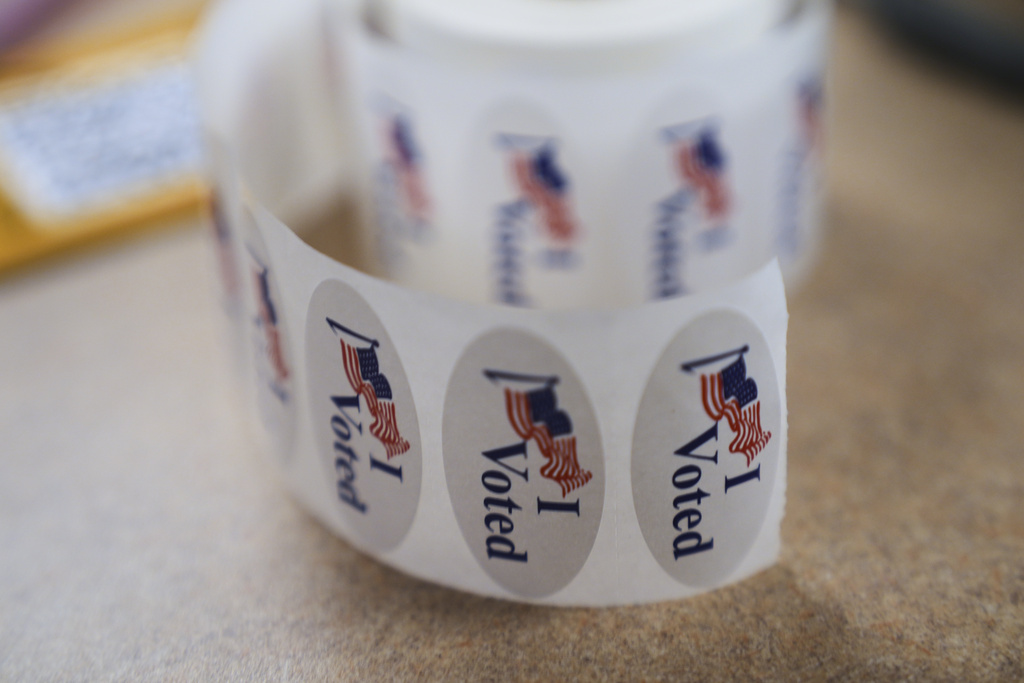 Labels reading "I Voted" are seen at the Orange County Registrar of Voters office in Santa Ana, Calif., on Wednesday, Oct. 29, 2025. (AP Photo/Damian Dovarganes)