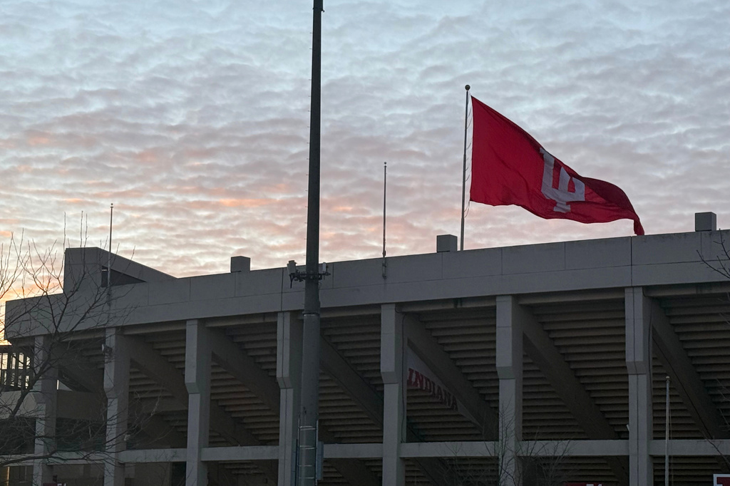 Indiana University's victory flag flies over Memorial Stadium on Tuesday, Jan. 20, 2026, in Bloomington, Ind. (AP Photo/Mike Marot)