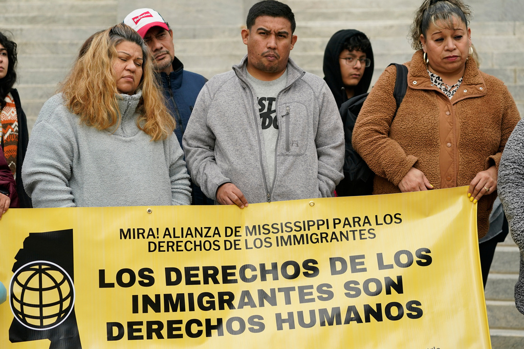 FILE - A group of immigrants attend a news conference held by the Mississippi Immigrants Rights Alliance regarding legislative proposals affecting immigrants and migrants in Mississippi, Wednesday, Jan. 25, 2023, at the Capitol in Jackson, Miss. (AP Photo/Rogelio V. Solis, File)