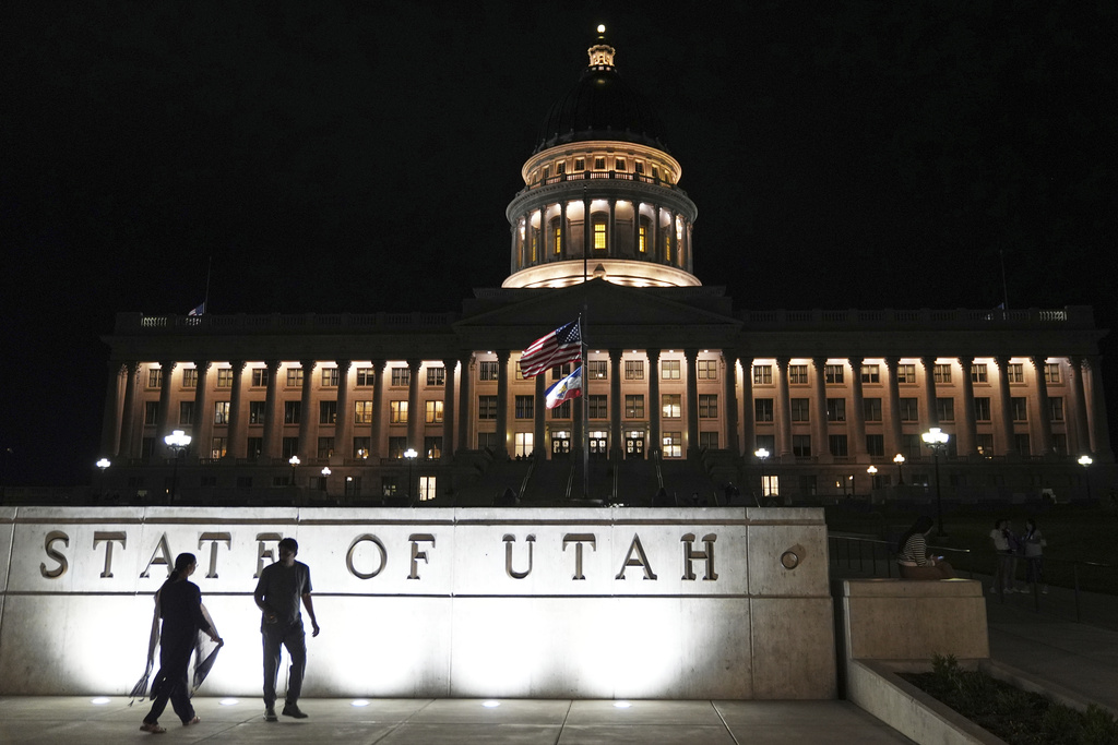 The American flag and the state flag of Utah fly at half-staff at the Utah State Capitol after Charlie Kirk was shot and killed Wednesday, Sept. 10, 2025, in Salt Lake City, Utah. (AP Photo/Lindsey Wasson)