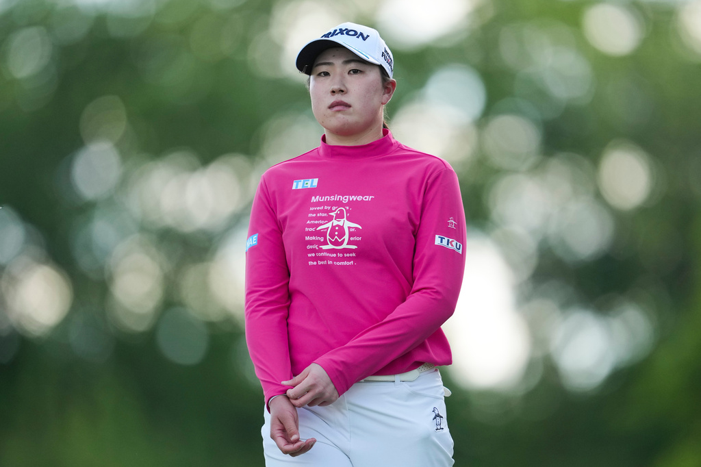 Rio Takeda looks on from the ninth hole during the first round of the Queen City Championship LPGA golf tournament at Maketewah Country Club, Thursday, May 14, 2026, in Cincinnati. (AP Photo/Jeff Dean)