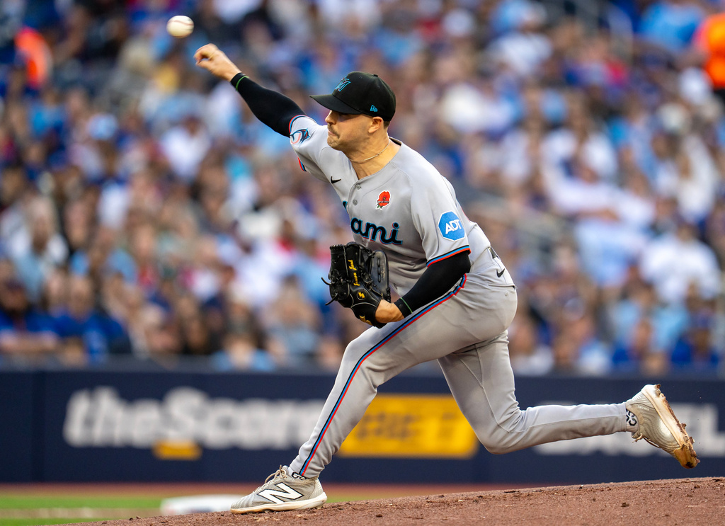 Miami Marlins starting pitcher Janson Junk throws to the Toronto Blue Jays during first-inning baseball game action in Toronto, Monday May 25, 2026. (Frank Gunn/The Canadian Press via AP)