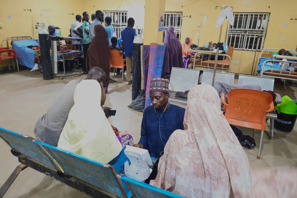 Patients receive treatment at a hospital in Damaturu after Nigerian Air Force strikes targeting jihadi rebels hit a local market Saturday in northeastern Nigeria, Sunday, April 12, 2026. (AP Photo/Micheal Abu)