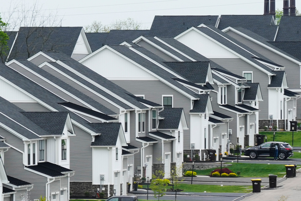 FILE - Newly developed homes sit in a row in Eagleville, Pa., April 28, 2023. (AP Photo/Matt Rourke, File)