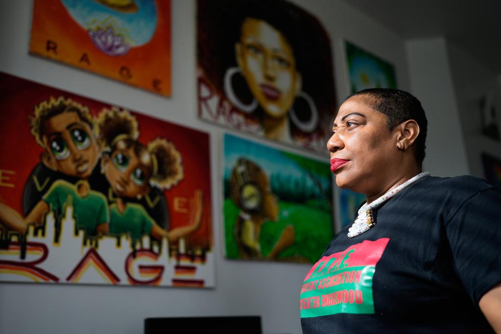 Asiaha Butler, the co-founder of the Resident Association of Greater Englewood, looks to outside from her office in Chicago, Monday, April 6, 2026. (AP Photo/Nam Y. Huh)
