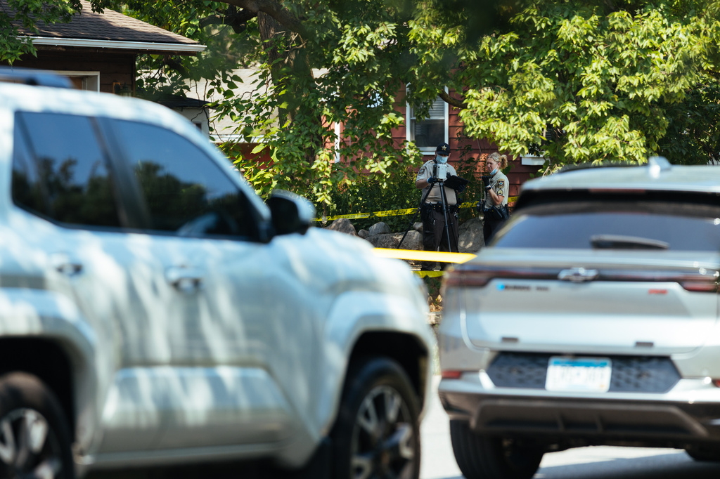 Law enforcement respond to a call at a home daycare, Wednesday, Aug. 12, 2026, in Hopkins, Minn. (AP Photo/Carly Danek)