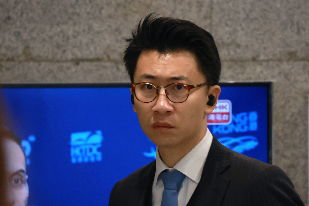 FILE - Senior counsel Benson Tsoi, for Dow Jones Publishing Co (Asia), arrives at Eastern Magistrates' Court to proceed a private prosecution brought by former Wall Street Journal employee Selina Cheng against the paper's parent company, Dow Jones Publishing Co (Asia), in Hong Kong on Dec 18, 2025. (AP Photo/May James, File)