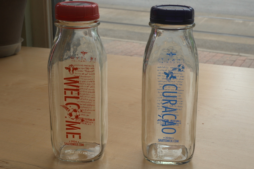 This image made from videos shows special bottles of The Shatto Milk Company milk with flavors themed for participating countries to celebrate the 2026 FIFA World Cup on display Tuesday, April 28, 2026, in Kansas City, Mo. (AP Photo/Nick Ingram)