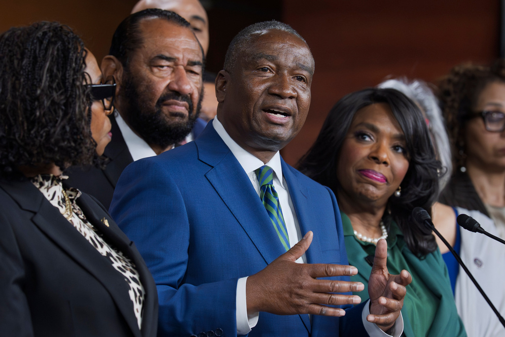 Rep. Cleo Fields, D-La., center, who represents Louisiana's 6th congressional district, is joined by members of the Congressional Black Caucus as they speak to reporters in the wake of the Supreme Court ruling to strike down his majority Black congressional district in Louisiana, at the Capitol in Washington, Wednesday, April 29, 2026. (AP Photo/J. Scott Applewhite)
